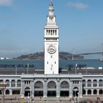 The Ferry Building is a terminal for ferries on the San Francisco Bay and an upscale shopping center located on The Embarcadero in San Francisco, California. The Bay Bridge can be seen in the background.