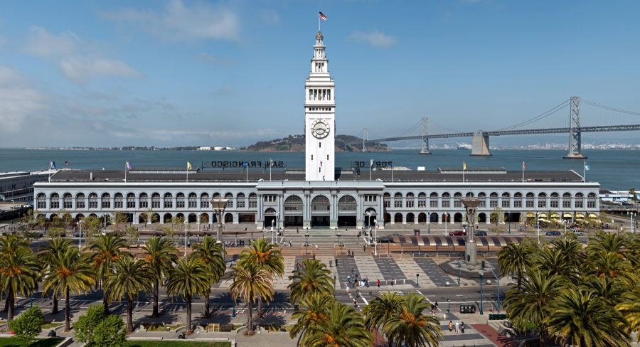 The Ferry Building is a terminal for ferries on the San Francisco Bay and an upscale shopping center located on The Embarcadero in San Francisco, California. The Bay Bridge can be seen in the background.