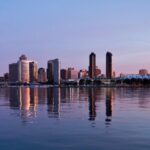The San Diego skyline reflects in San Diego Bay during an early morning sunrise. Photo taken January 9, 2013.