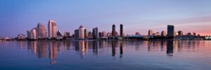 The San Diego skyline reflects in San Diego Bay during an early morning sunrise. Photo taken January 9, 2013.